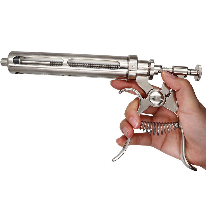 ステンレス鋼の動物の注入リクライニング、なだめるような詰め物 - Veterinary Syringe Gun のレビューと価格